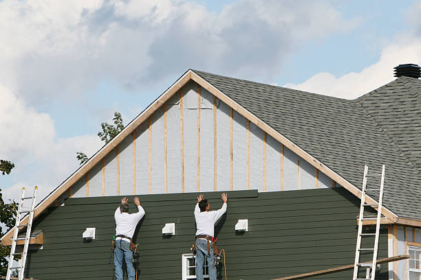 Professional Emergency Siding Repair technician working in Wakeman, OH